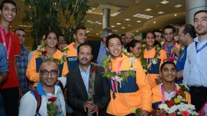 بالصور| مطار القاهرة يستقبل أبطال 