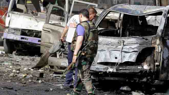 مصرع 14 شخصا في تفجيرين قرب مركز للشرطة في وسط دمشق