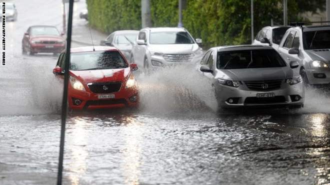 بالصور| شوارع أستراليا تغرق في مياه الفيضانات