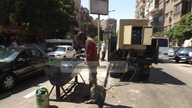 بالصور| حملة نظافة في شارع السودان.. وصناديق جديدة للقمامة 