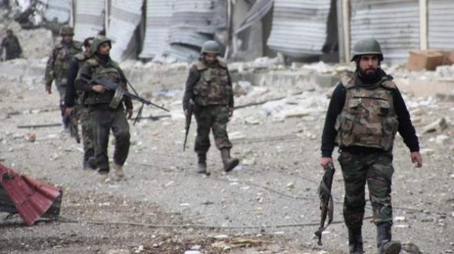 عشرات الجنود السوريين محاصرون داخل مبنى في جسر الشغور