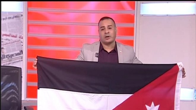 بالفيديو|القرموطي يرفع علم الأردن دعما للأمير علي بن الحسين في 