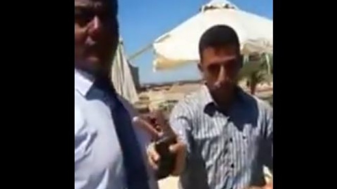 بالفيديو| أمن قرية سياحية يمنع محجبة من النزول في حمام السباحة ويغلقه