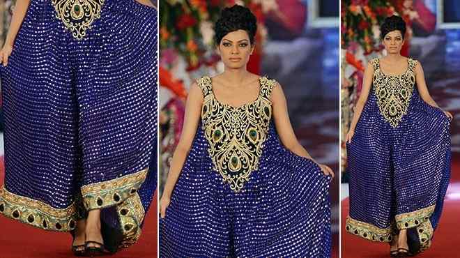 بالصور| التطريز المكثف يميز أزياء الزفاف في باكستان بأسبوع الموضة