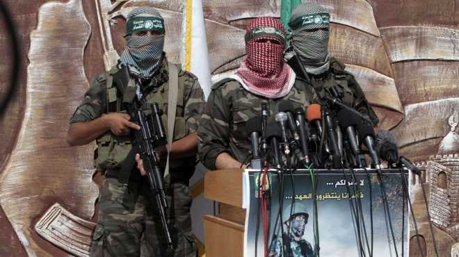 بالصور| في الذكرى الأولى للإفراج عن شاليط.. حماس تلوح بأسر جنود جدد