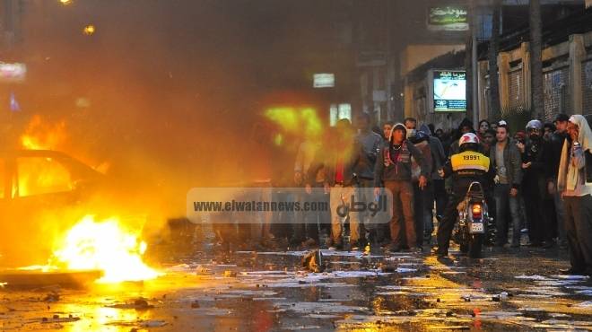  الإخوان يضرمون النيران في سيارة ونقطة شرطة بالإسكندرية