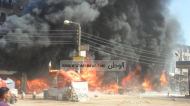  حريق بسوق البالة بجوار مسجد التوحيد مقر اعتصام مؤيدي 
