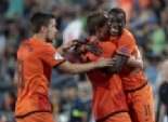 هولندا تتأهل لنهائيات كأس العالم لكرة القدم 2014