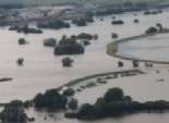  بالصور| العالم يغرق.. أمطار في الهند وفيضانات بفرنسا وألمانيا 