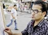 رسام شارع «شهاب»: وجه محمد مرسى لا يصلح للرسم 