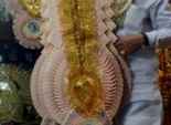  بالصور| بعد انهيار العملة المحلية.. الهنود يصنعون أكاليل الزفاف من 