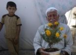  بالصور| أزهار الأمل تزين خيم اللاجئين السوريين في تركيا 