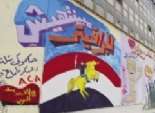 رسامو الثورة يعترضون على مسح جرافيتى محمد محمود بـ«طرطشة على الحيط»