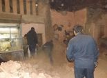 بالصور| انهيار عقار خالي من السكان بمدينة الفيوم بعد اصطدام سيارة ميكروباص به