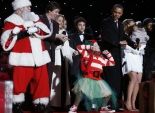 بالصور| وسط الأمطار.. أوباما يضيء شجرة عيد الميلاد