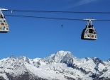  بالصور| فرنسي يسير على سلك رفيع بارتفاع 111 مترًا فوق جبال الألب 