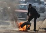  الإخوان يشعلون إطارات السيارات أمام نادي الشمس.. ومصفحة شرطة تتقدم في داخل أحمد عصمت 