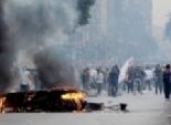 أنصار المعزول يقتحمون مرور حلوان ويشعلون النار في سيارات الشرطة