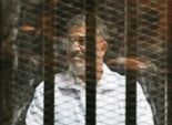 وصول مرسي الي أكاديمية الشرطة فى قضية اقتحام السجون