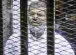 «مرسى» للمحامى المنتدب: «القفص الزجاجى مش لرئيس الجمهورية»