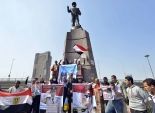  بالصور| وقفة لأنصار السيسي في ميدان عبد المنعم رياض بالأعلام المصرية 