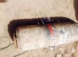  بالصور| العثور على صاروخ طائرة من مخلفات الحروب أثناء تطهير مصرف ببورسعيد