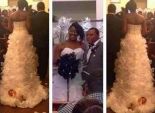 عروس أمريكية تستفز الحضور بوضع طفلتها على ذيل فستان الزفاف
