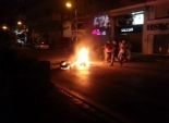 مجهولون يقطعون طريق منية النصر بالدقهلية ويشعلون النار في إطارات سيارات