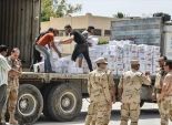 الهلال الأحمر الفلسطينى يتسلم مساعدات الجيش المصرى