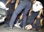 شرطى أمريكى يصف المتظاهرين فى «فيرجسون» بـ«الكلاب المسعورة»
