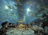 بالصور| عشاء صيني في أعماق البحار على أضواء الشموع