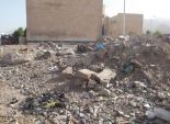 بالصور| القمامة والبلاعات المكشوفة كابوس يطارد أهالي 