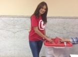 بالصور| درة تدلي بصوتها في الانتخابات البرلمانية التونسية بـ