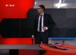 بالفيديو| مسلح أنيق يقتحم التليفزيون الهولندي ويعطل نشرة الأخبار