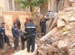 إزالة العقار المشتعل بشارع الفجالة في ميدان رمسيس