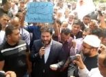 بالصور| نجل مرسي يشارك في تشييع جثمان القيادي الإخواني فريد إسماعيل