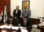 اتفاقية تعاون بين كلية التجارة بالإسكندرية ومعهد البحوث بجامعة الفيوم
