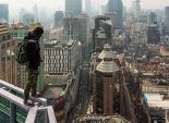 بالصور| مغامران يتسلقان قمم العالم للحصول على لقطات رائعة