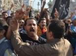  اشتباكات بالأيدى بين مؤيدي ومعارضي مرسي في أسيوط