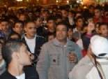  متظاهرو الإسكندرية ينزعون صور 