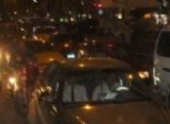  تعطل المرور بشارع فيصل بعد توزيع أعضاء 