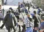 اشتباكات عنيفة بين أسر الشهداء والأمن خلال جلسة «قتل المتظاهرين» بالإسكندرية