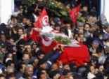 بالصور| غاز مسيل للدموع في جنازة بلعيد ومناوشات مع الشرطة في العاصمة تونس 