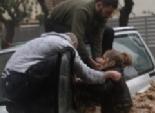  بالصور| إنقاذ امرأة أثناء انهمار أمطار غزيرة على أثينا.. في أسوأ عاصفة منذ 25 عاما