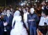  عروس تحتفل بزفافها وسط اشتباكات المنصورة