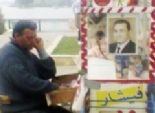  صورة «مبارك» على عربة «فيشار»: «إحنا آسفين يا ريس»