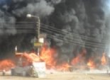 حريق بسوق البالة بجوار مسجد التوحيد مقر اعتصام مؤيدي 